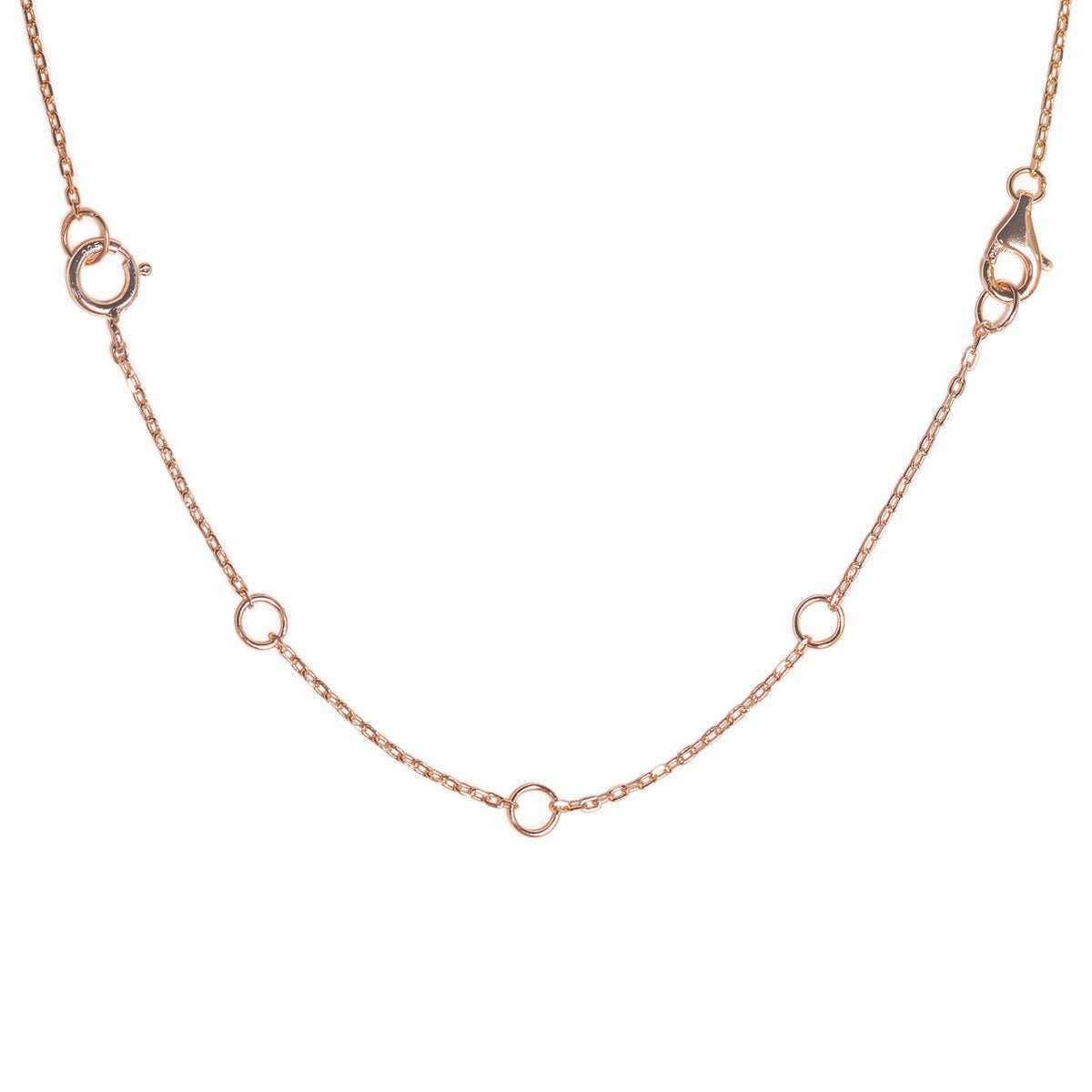 Rose gold vermeil extender chain with lobster and spring-ring clasps and rings, on a white background