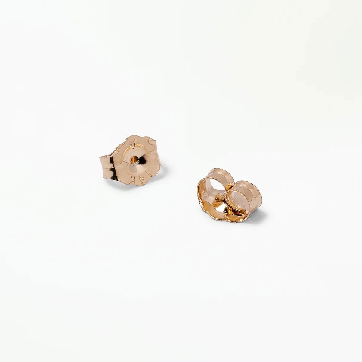 14K gold earring backs shown front and side on a white background