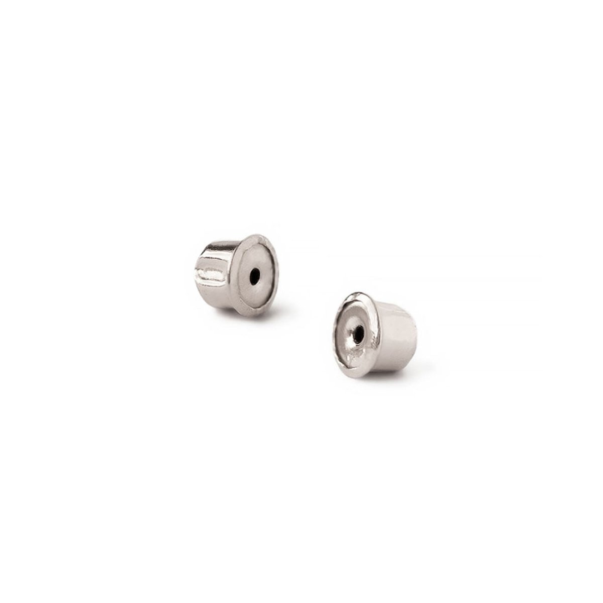 Pair of white gold push-on earring backs for amethyst studs, close-up on a white background