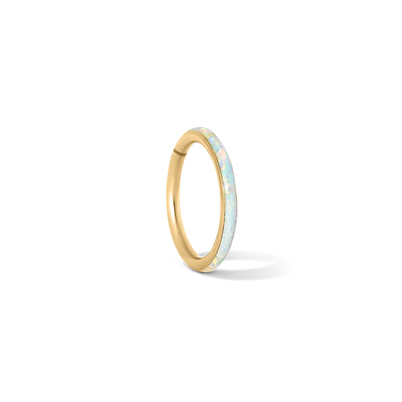 Gold seamless clicker hoop with white opal inlay, on a white background