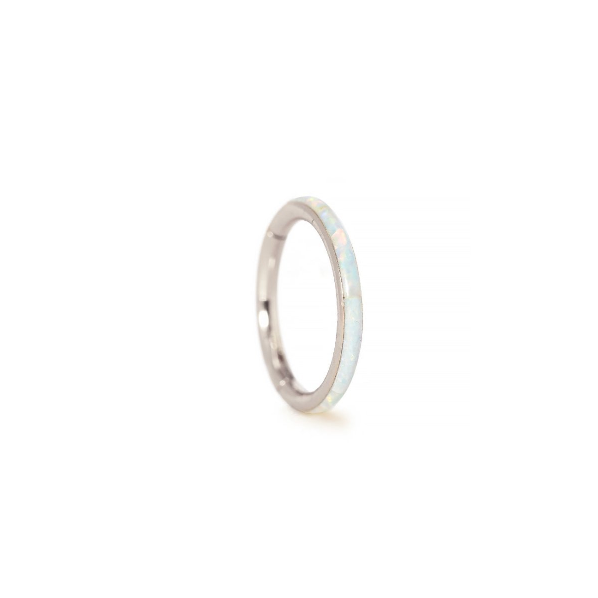 Sterling silver seamless clicker hoop with white opal inlay, on a white background