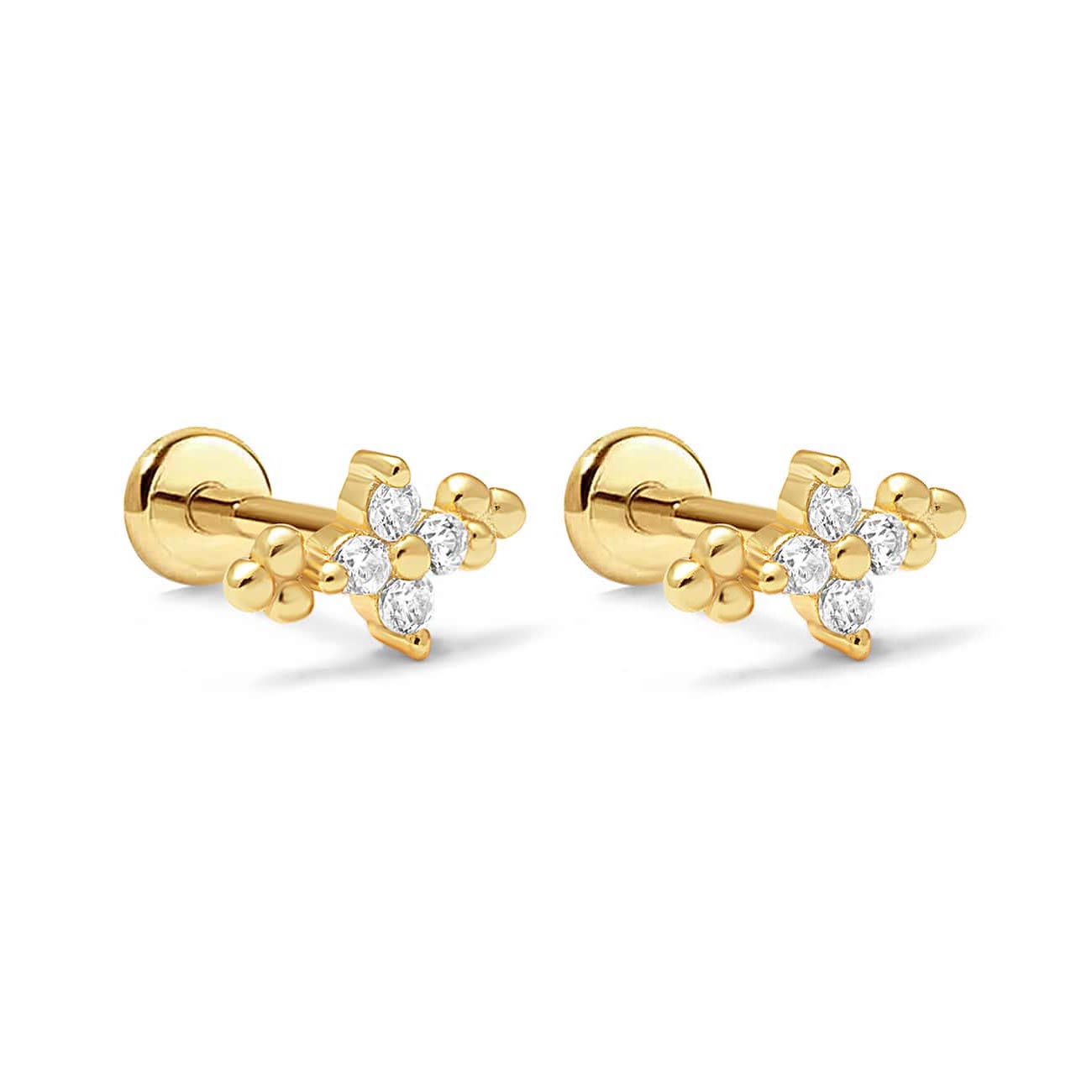 Pair of gold vermeil flat back studs with four-stone zirconia flower clusters and beaded accents, on a white background