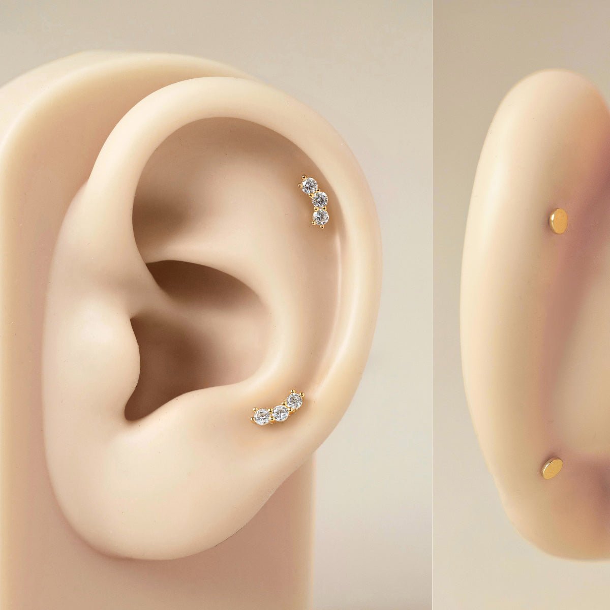 Gold vermeil curved white zirconia flat back stud on a silicone ear model, showing size and placement