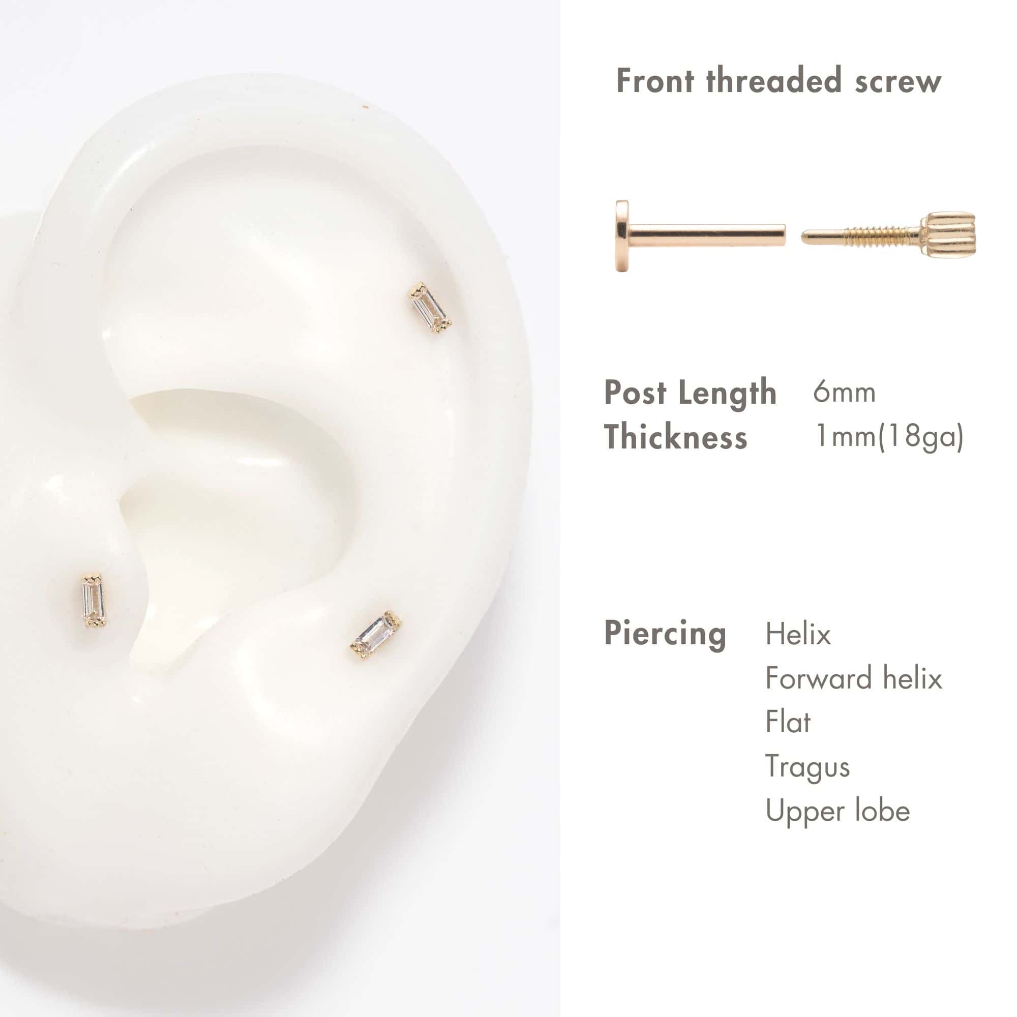 14K gold baguette crystal flat back stud on an ear model with post-length and piercing-placement guide