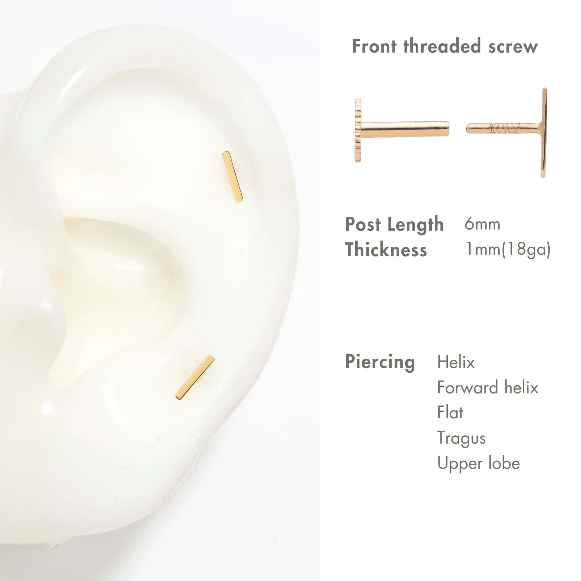 14K gold mini bar flat back stud shown on a model's lobe with the post and screw back