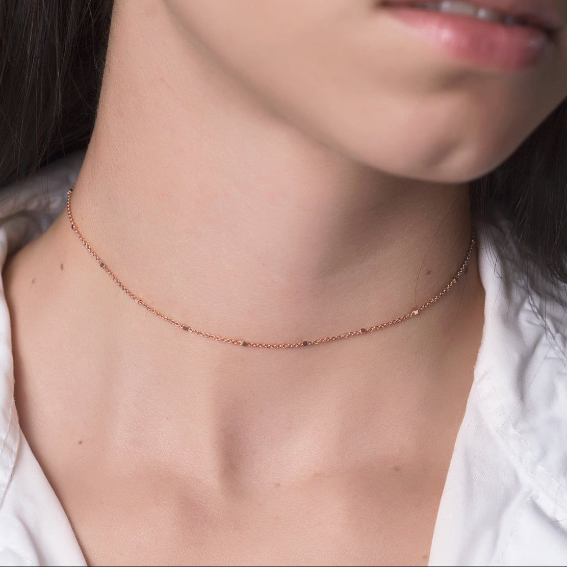 Rose gold vermeil beaded satellite chain choker, shown on a model's neckline