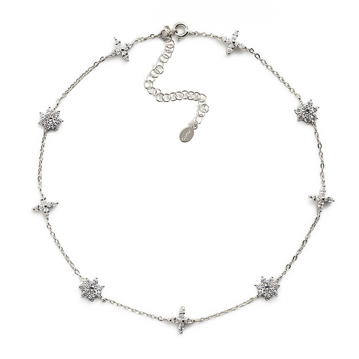 Sterling silver choker with pavé clear crystal flower and four-petal stations, on a white background