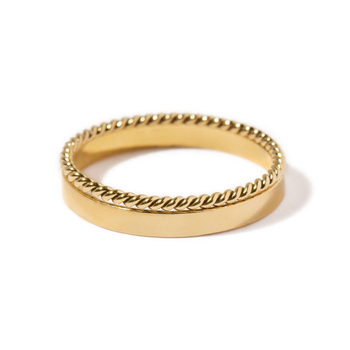 Gold-filled stacking ring set, a flat band paired with a twisted rope band, on a white background