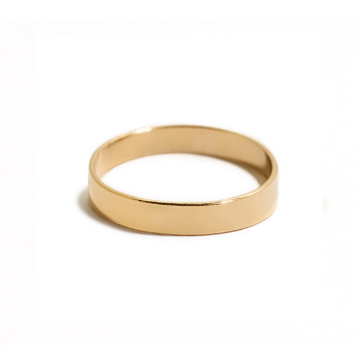 Gold vermeil flat cigar band ring, shown on a white background