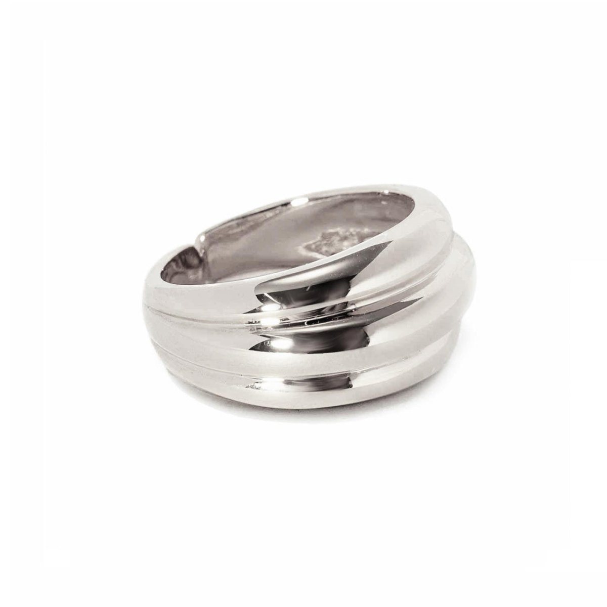 Sterling silver dome statement ring with a ridged grooved band, on a white background
