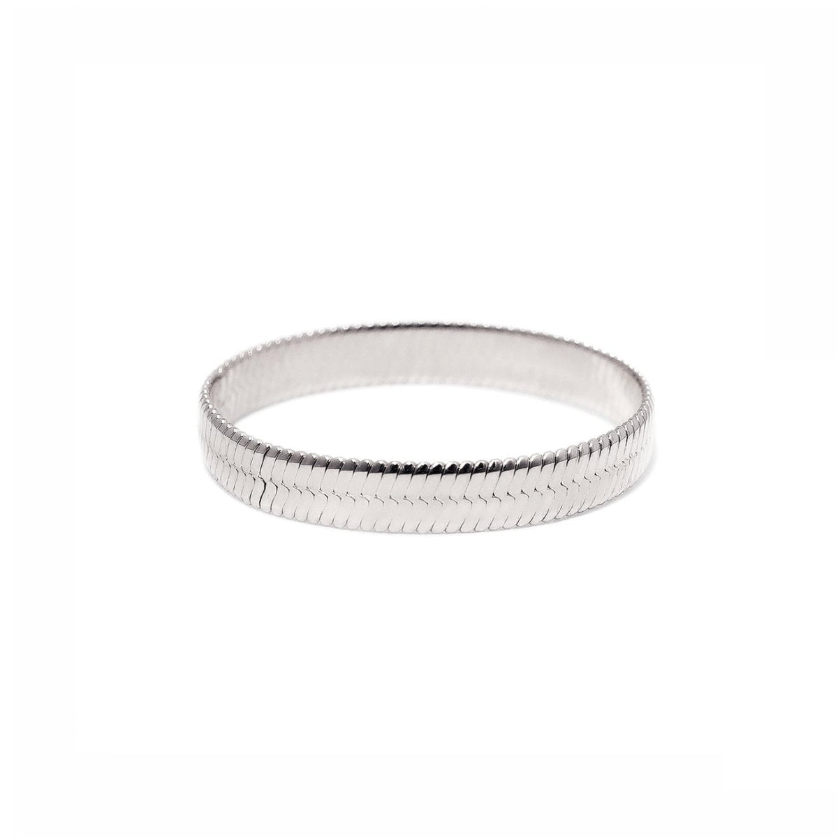 Sterling silver herringbone chain stacking ring with a flat snake-link band, on a white background