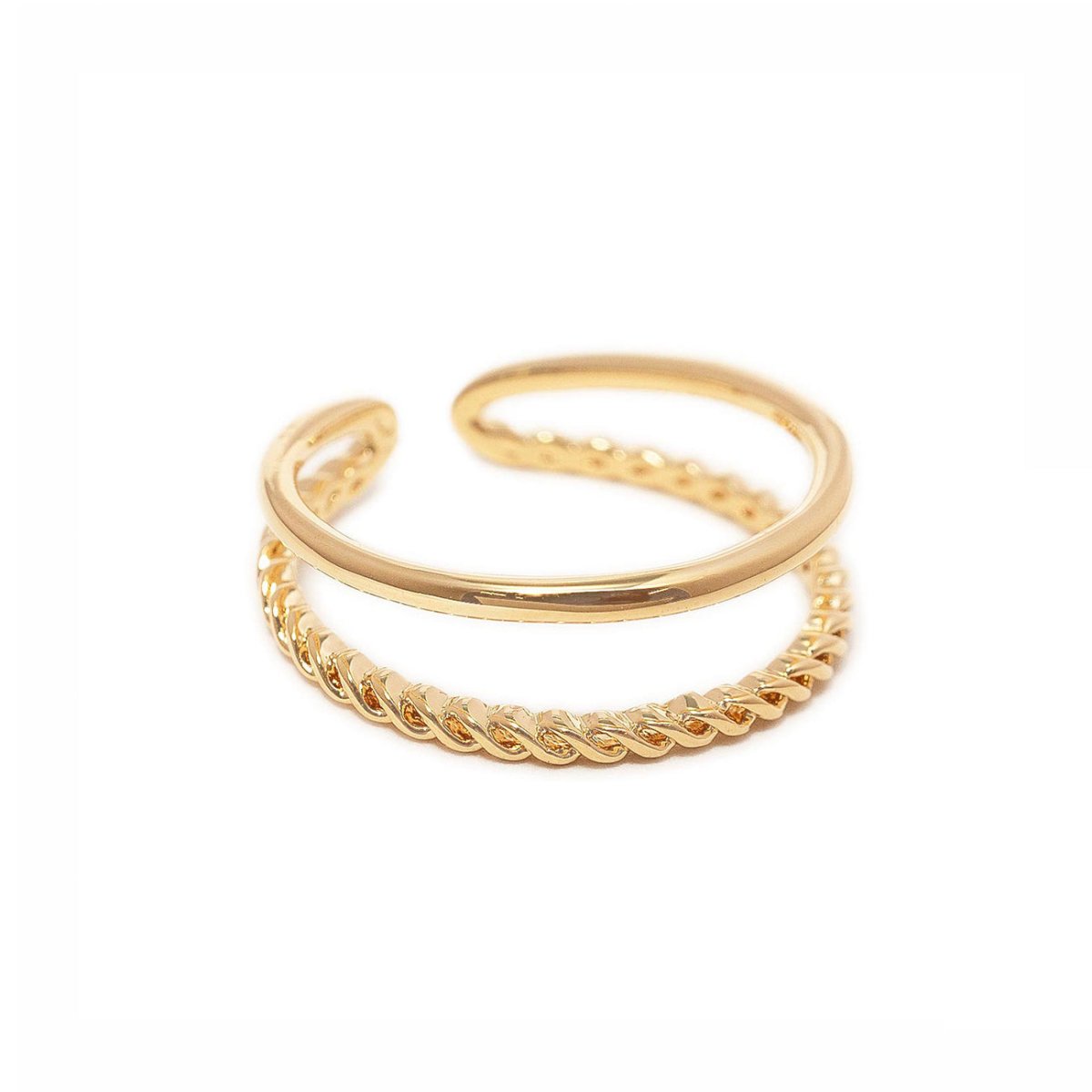 Gold vermeil rope-twist double-band stacking ring, close-up detail on a white background