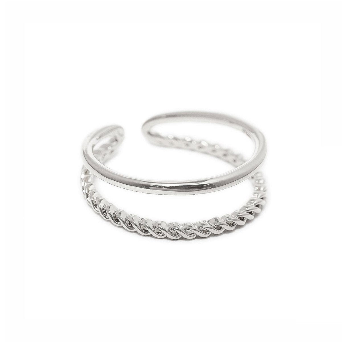 Sterling silver rope-twist double-band stacking ring, close-up detail on a white background