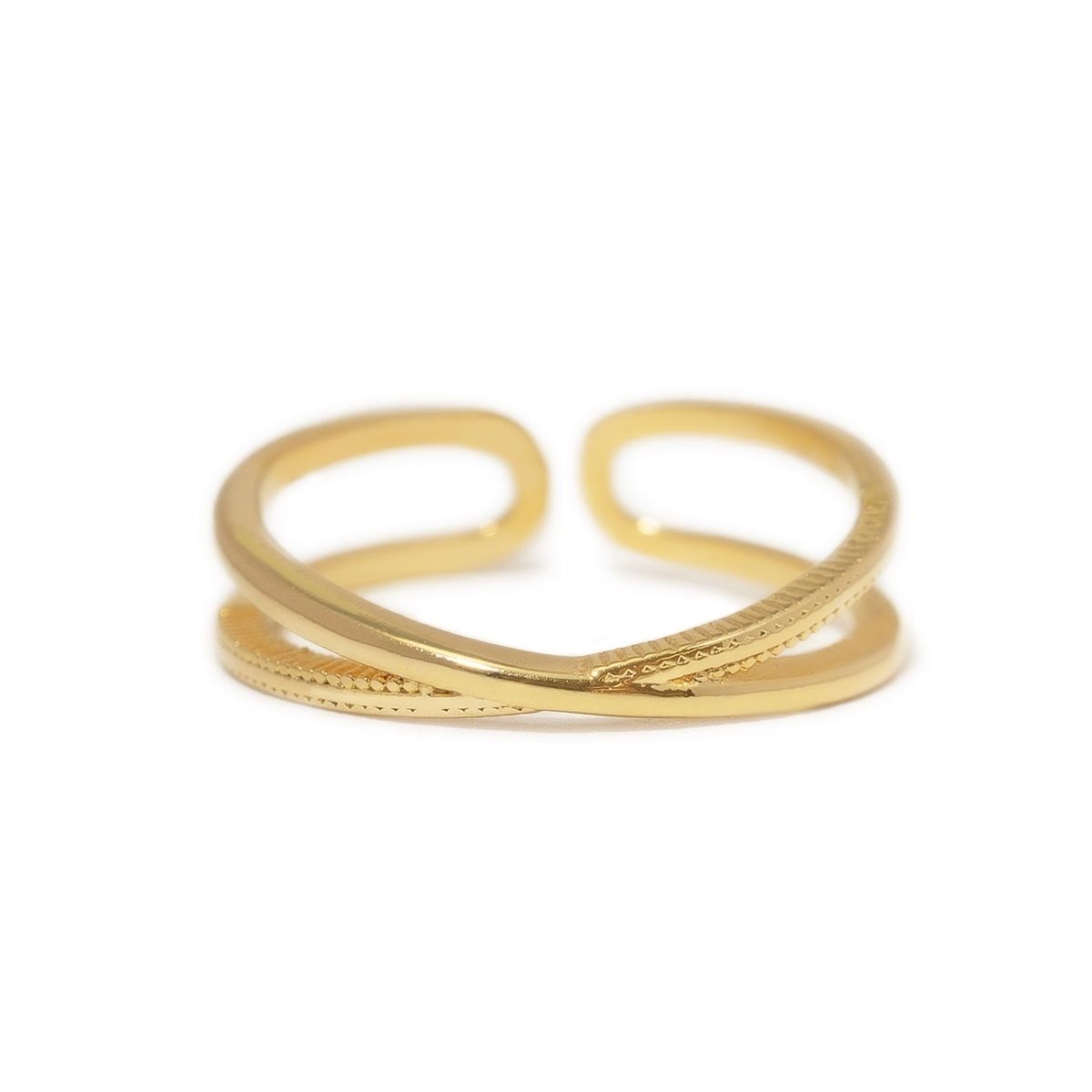 Gold vermeil X stacker ring with a crossover open band, on a white background
