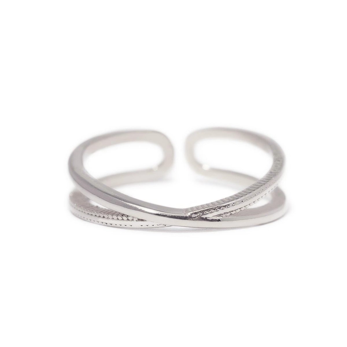 Sterling silver X stacker ring with a crossover open band, on a white background