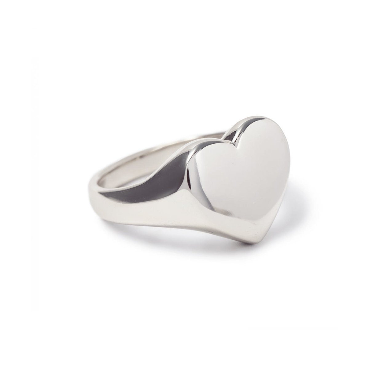 Sterling silver heart signet ring with a smooth polished face, on a white background