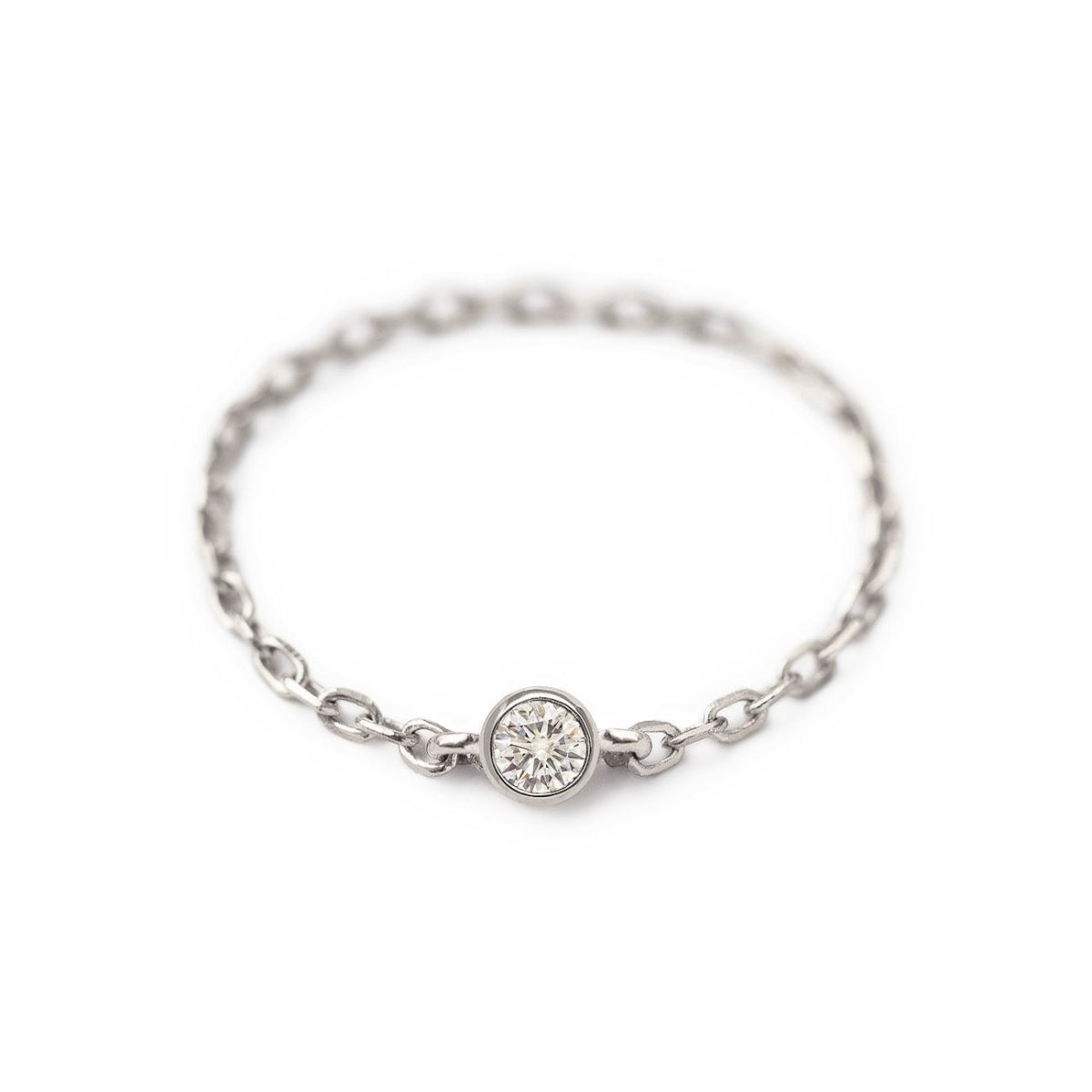 14K white gold chain ring with a single bezel-set clear stone, on a white background