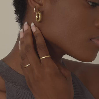 Model wearing Thin Band Ring from AMYO
