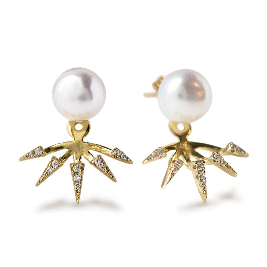 Gold vermeil pearl spike ear jackets with pavé-set clear stones, pair on a white background