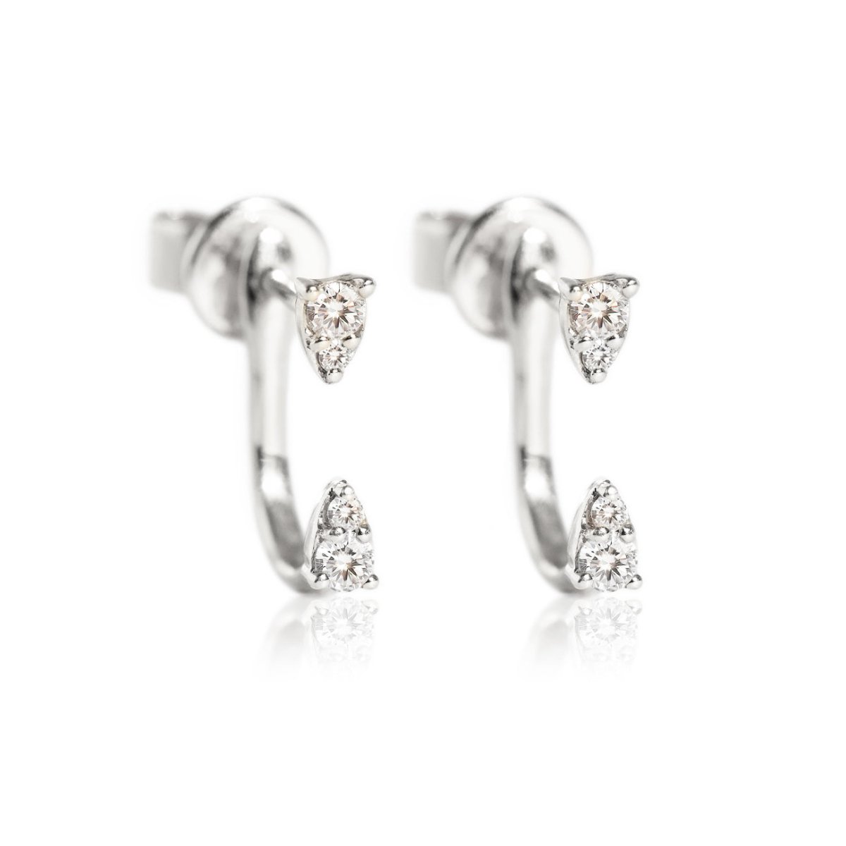 Pair of 14K white gold diamond ear jacket studs with pointed clusters, on a white background