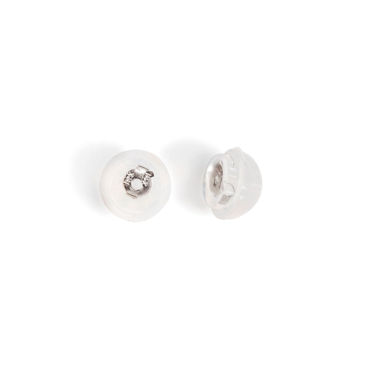 Pair of clear silicone earring backs with a white gold metal core, on a white background